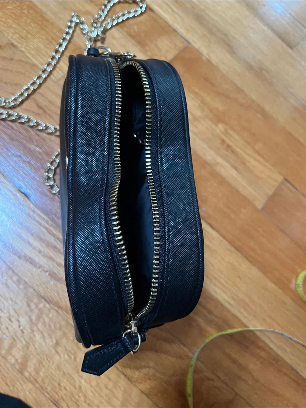 GUESS Black Heart Crossbody with Gold Chain Detail